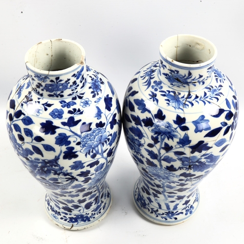 1101 - A pair of 19th century Chinese blue and white porcelain jars and covers with dragon decoration, 4 ch... 