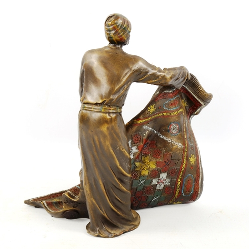 1302 - Bergmann style cold painted bronze sculpture, Arab carpet seller, height 20cm