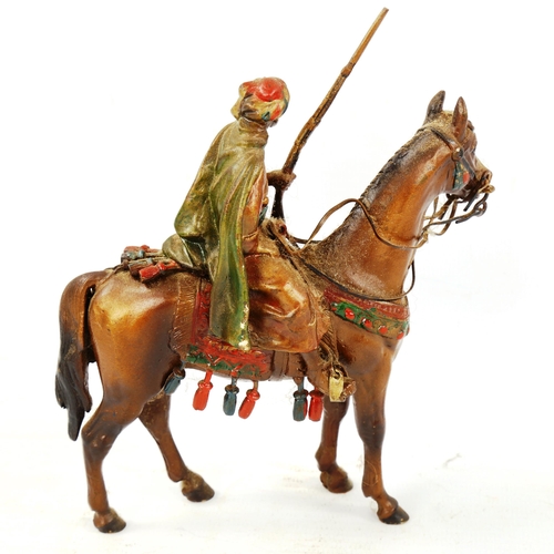 1306 - Austrian cold painted bronze Arab rifleman on horseback, length 12cm, height 15cm