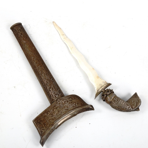 1339 - An Indonesian silver kris dagger, blade stamped 925, with ornate unmarked silver handle and chased a... 