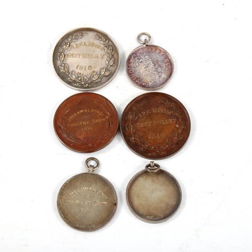 1348 - A group of Poultry related Agricultural and Horticultural Society of India medallions, including thr... 