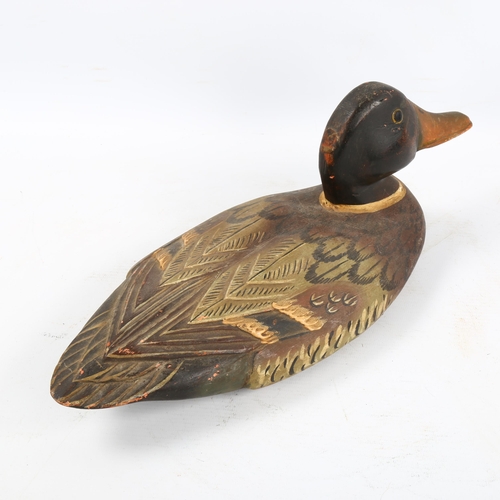 1353 - A Folk Art painted wood decoy duck, length 36cm