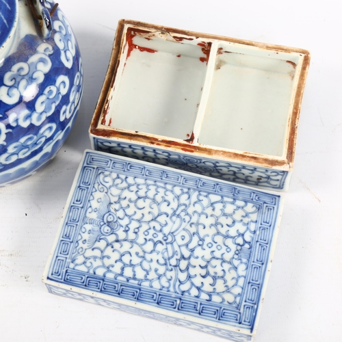 1355 - A Chinese blue and white porcelain dragon teapot, height 12cm, and a blue and white porcelain rectan... 