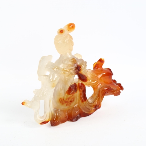 1356 - A Chinese carved jade figure, height 12cm
