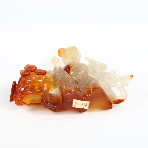 1356 - A Chinese carved jade figure, height 12cm