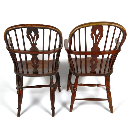 1074 - 2 similar 19th century elm-seated bow-arm Windsor chairs
