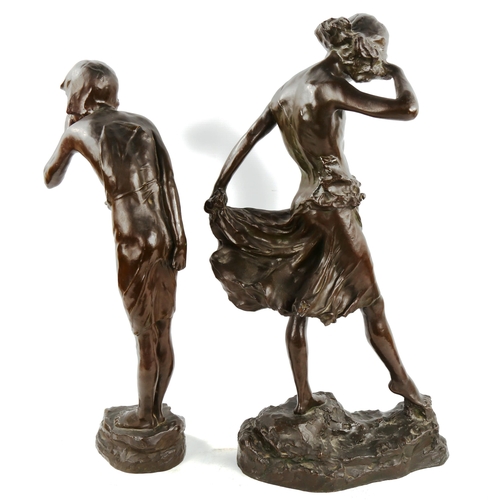1369 - A pair of patinated bronze sculptures of whispering children, early 20th century, unsigned, largest ... 