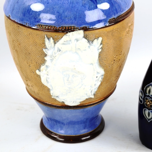 1377 - A Royal Doulton ewer with relief Jockey plaque and two Doulton bottles, tallest 29cm