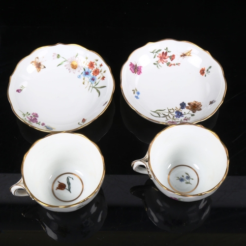 1028 - A German white glaze porcelain Tea for Two set on matching tray, with hand painted botanical decorat... 