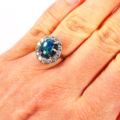 201 - An 18ct gold black opal and diamond oval cluster ring, set with oval cabochon opal and modern round ... 