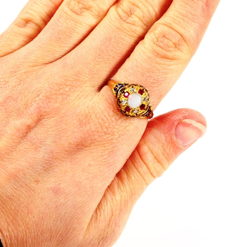 203 - An Antique Continental opal ruby diamond and blue enamel dress ring, unmarked gold settings, setting... 