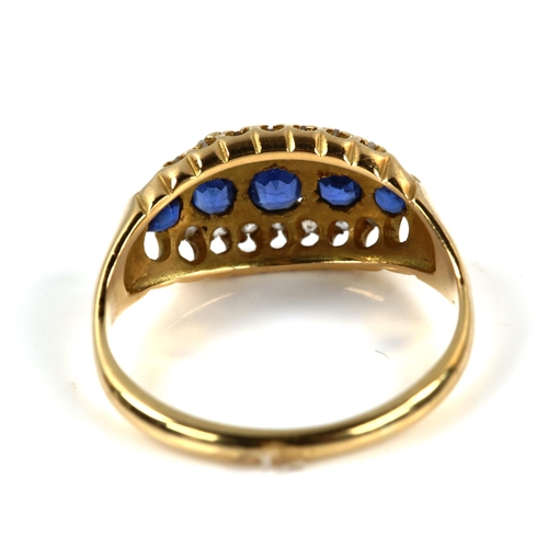 207 - An early/mid-20th century 18ct gold sapphire and diamond cluster half hoop ring, set with oval-cut s... 