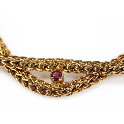 211 - A 9ct gold five stone garnet mesh crossover necklace, length 43cm, 17.5g