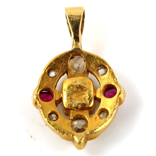 218 - A small Continental unmarked gold emerald ruby and diamond pendant, set with old-cut diamonds, penda... 