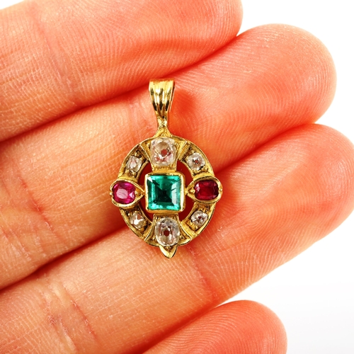 218 - A small Continental unmarked gold emerald ruby and diamond pendant, set with old-cut diamonds, penda... 