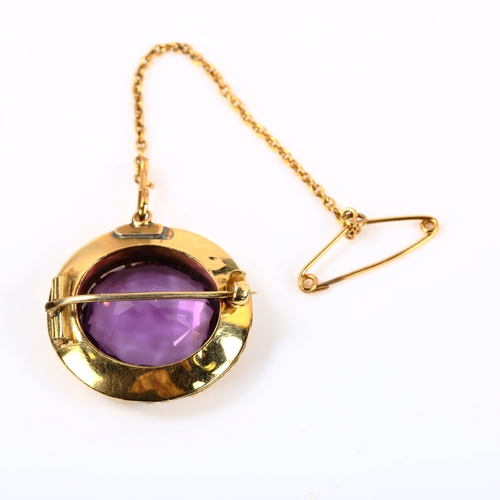 225 - A Victorian unmarked gold amethyst brooch, cast floral surround, brooch length 23.5mm, 7.2g