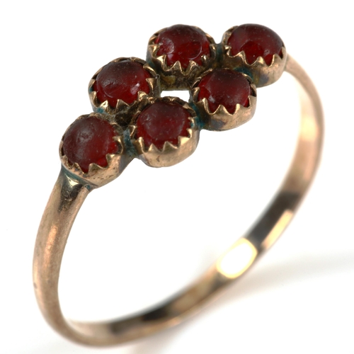 236 - A Victorian unmarked rose gold garnet dress ring, 7.6mm, size Q, 1.4g