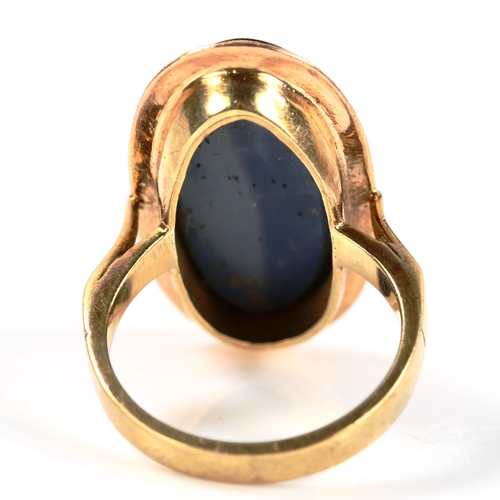 240 - A 9ct gold black opal doublet panel ring, textured surround, setting height 25.2mm, size L, 5.1g