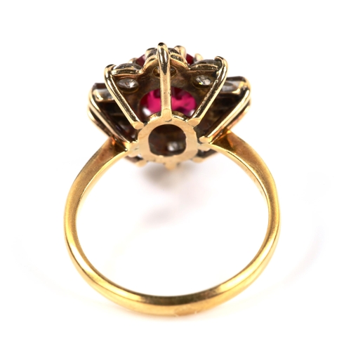 245 - A mid/late 20th century ruby and diamond cluster dress ring, unmarked gold settings with oval mixed-... 