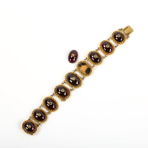 248 - A Georgian garnet and diamond panel bracelet, unmarked yellow metal settings with oval cabochon garn... 