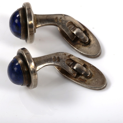 256 - GEORG JENSEN - a pair of Danish silver and lapis lazuli cufflinks, model no. 44, panel length 17mm, ... 