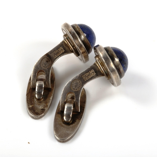 256 - GEORG JENSEN - a pair of Danish silver and lapis lazuli cufflinks, model no. 44, panel length 17mm, ... 