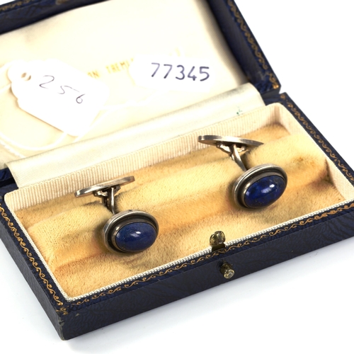 256 - GEORG JENSEN - a pair of Danish silver and lapis lazuli cufflinks, model no. 44, panel length 17mm, ... 