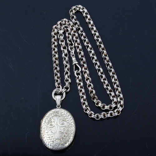 259 - A Victorian unmarked silver photo locket pendant necklace, on unmarked silver belcher link chain, pe... 