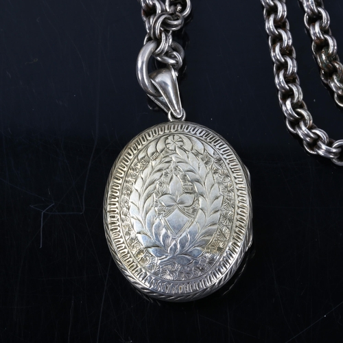 259 - A Victorian unmarked silver photo locket pendant necklace, on unmarked silver belcher link chain, pe... 