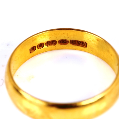 267 - A mid-20th century 22ct gold wedding band ring, hallmarks London 1965, band width 4.3mm, size N, 3.9... 