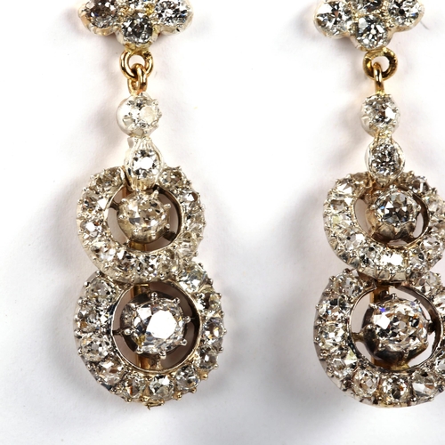 271 - A fine pair of diamond target drop earrings, unmarked gold and silver settings with old-cut diamonds... 