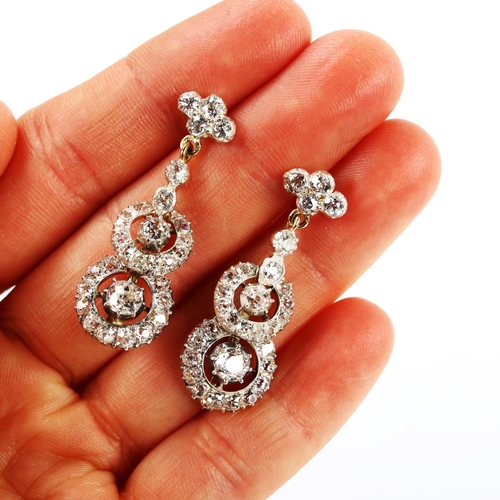 271 - A fine pair of diamond target drop earrings, unmarked gold and silver settings with old-cut diamonds... 