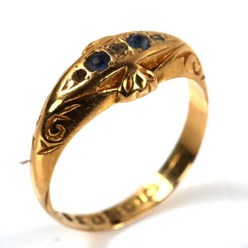 275 - An early 20th century 18ct gold graduated five stone sapphire and diamond half hoop ring, hallmarks ... 