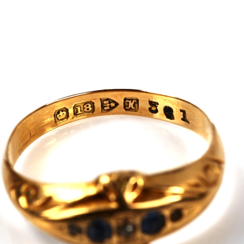 275 - An early 20th century 18ct gold graduated five stone sapphire and diamond half hoop ring, hallmarks ... 