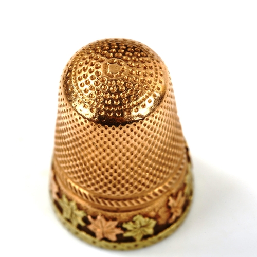 281 - A Victorian unmarked two-colour gold thimble, height 22.1mm, 4.2g