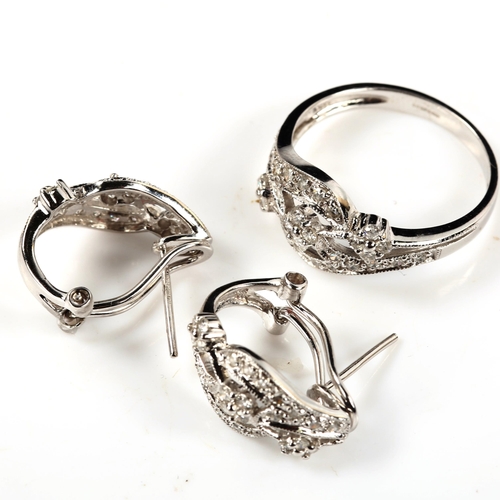 286 - A 14ct white gold diamond floral matching ring and earring set, ring setting height 10.4mm, size O, ... 