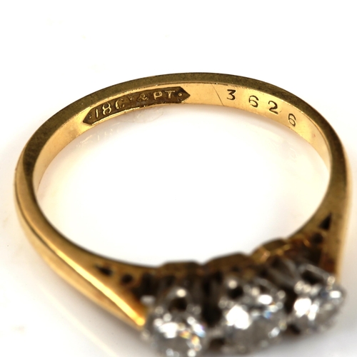 287 - An 18ct gold three stone diamond ring, set with modern round brilliant-cut diamonds, total diamond c... 