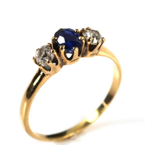 288 - An 18ct gold three stone sapphire and diamond ring, set with oval mixed-cut sapphire and old-cut dia... 