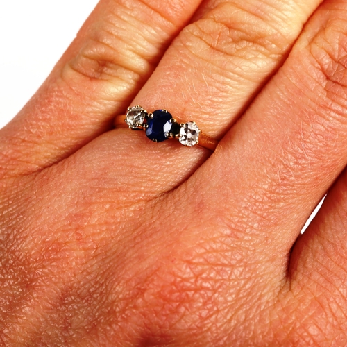 288 - An 18ct gold three stone sapphire and diamond ring, set with oval mixed-cut sapphire and old-cut dia... 