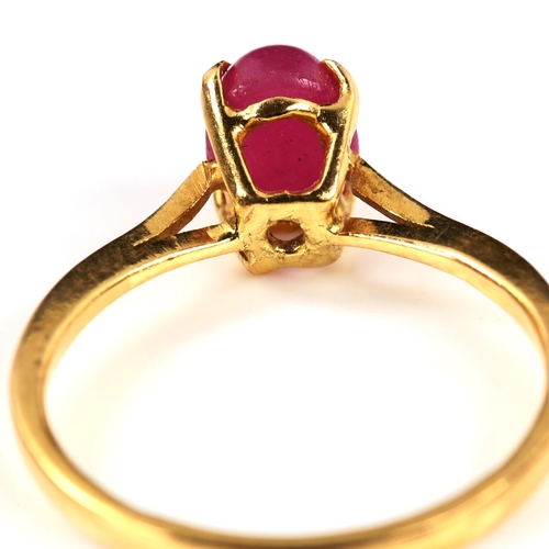 291 - A modern 18ct gold cabochon ruby dress ring, ruby measures: 7.00mm x 5.42mm x 4.20mm, size N, 2.3g