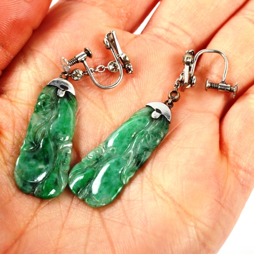 297 - A pair of Art Deco jade and diamond gourd drop earrings, unmarked white metal settings with carved d... 