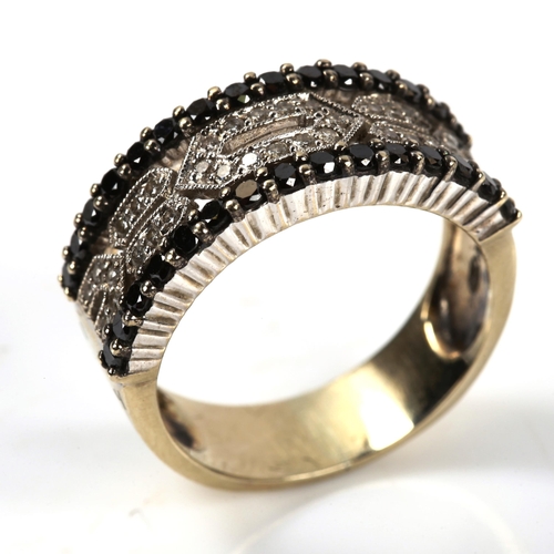 299 - A modern 18ct white gold black diamond and diamond band ring, in Art Deco style, setting height 8.5m... 