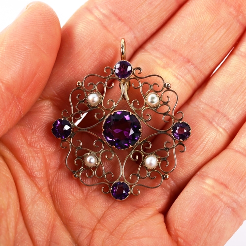 301 - An Edwardian unmarked rose gold amethyst and pearl openwork pendant, pendant height 38.1mm, 4.5g