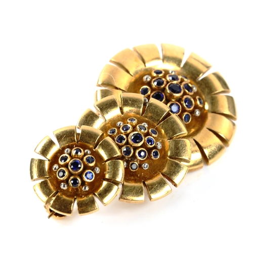 302 - A late 20th century sapphire flowerhead brooch, unmarked high carat gold settings, brooch length 46.... 