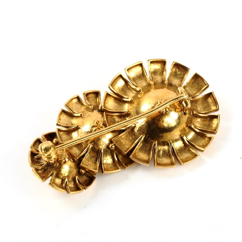 302 - A late 20th century sapphire flowerhead brooch, unmarked high carat gold settings, brooch length 46.... 