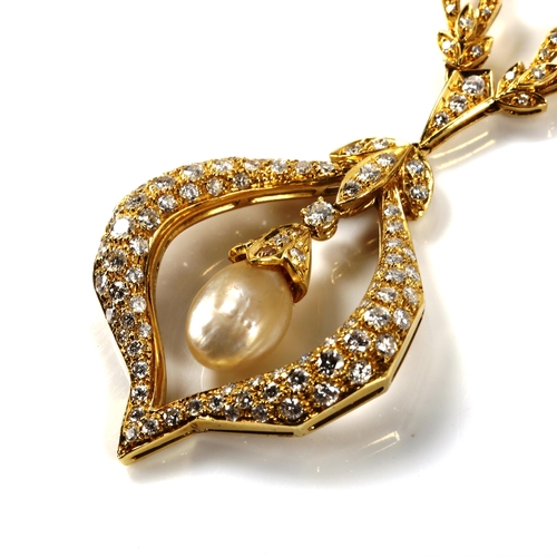 311 - A large modern Continental 18ct gold Baroque pearl and diamond pendant necklace, set with modern rou... 