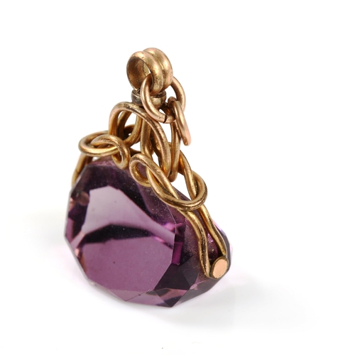 315 - A faceted amethyst swivel fob seal, on gold plated frame, fob height 32.2mm, 11.3g