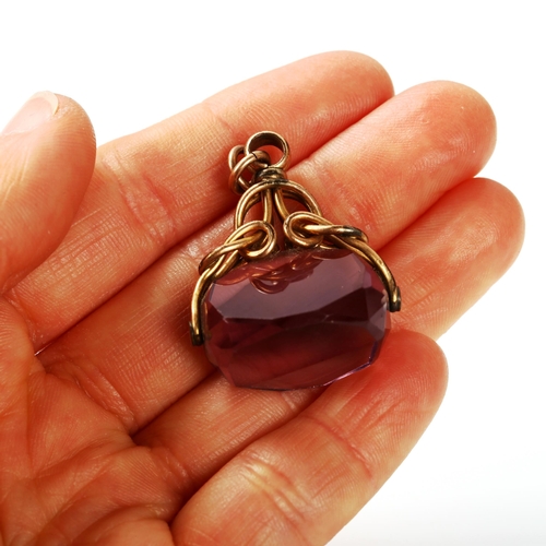 315 - A faceted amethyst swivel fob seal, on gold plated frame, fob height 32.2mm, 11.3g