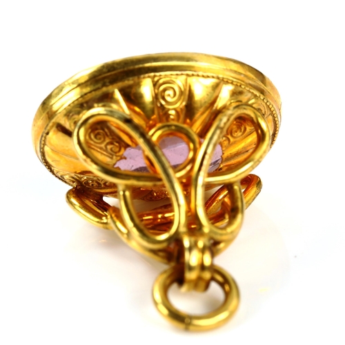 316 - An unmarked gold amethyst fob seal, amethyst length 19.6mm, fob height excluding bale 20.5mm, 6.5g