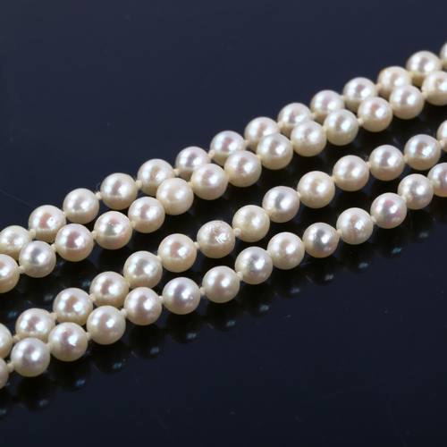 318 - A late 20th century double-strand pearl necklace, with 9ct gold sapphire and pearl clasp, necklace l... 